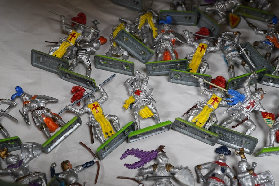 A quantity of Britains plastic soldiers; including Britains Deetail series, including; notes, infantry, native Americans, it Turkish Warriors, archers, WWII soldiers, etc. Condition - good